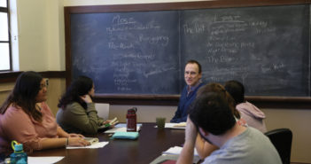 Professor and novelist Greg Bills discusses short stories with his Fiction II class. (Photo by Taylor Matouseck '18)