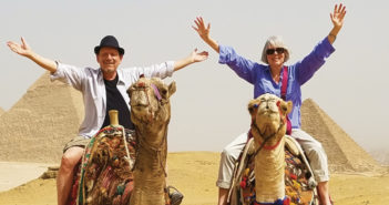 Kathy Talbert Weller ’71 and husband Michael Weller revel in traveling through the Giza Pyramids near Cairo, Egypt.