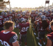 The Bulldogs prepare for their first home game of the season. They go on to beat the George Fox Bruins, 20 to 12. (Photo by William Vasta)