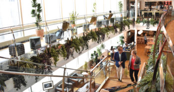 Senecal Endowed Dean Tom Horan and Associate Vice President for Enrollment Nancy Svenson enjoy the Los Angeles Gas Tower WeWork location. (Photo by Carlos Puma)
